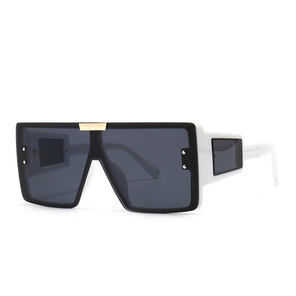 Large frame sunglasses with widened legs and patch sunglasses