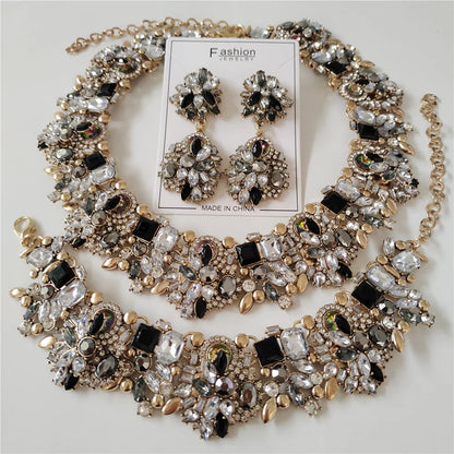 Jewelry set with necklace and earrings on a white background