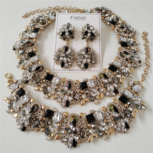 Jewelry set with necklace and earrings on a white background